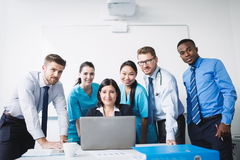 team-doctors-smiling-conference-room